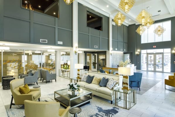 A bright and spacious lobby area with comfortable seating