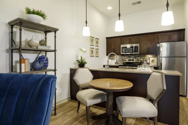 Modern kitchen and dining area in assisted living space