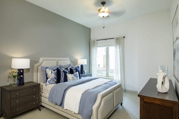 Well-designed resident room with elegant decor and natural light