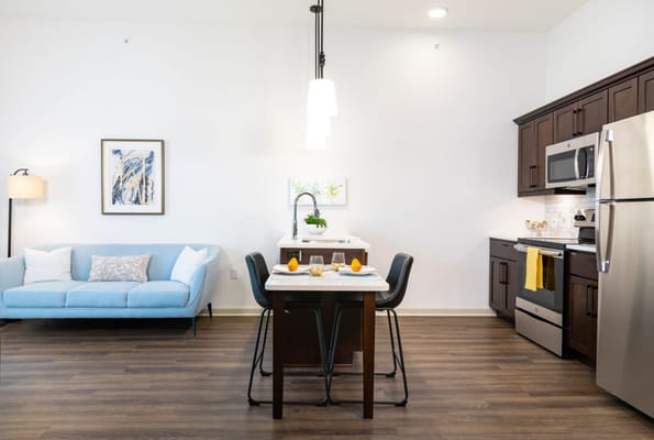 Modern kitchen and living area in a senior living space
