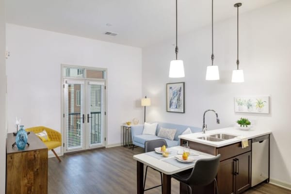 Bright and welcoming common area with kitchen