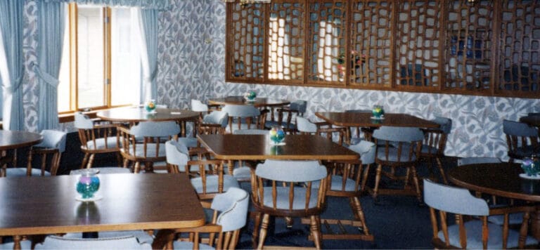 Dining area with wooden tables and chairs