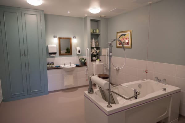 Modern assisted living bathroom with accessibility features
