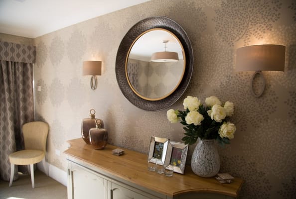 Stylish interior decor with flowers and artwork