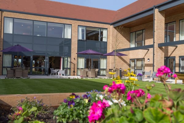 Outdoor space featuring garden and seating area