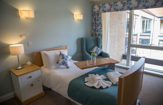 Cozy resident room with natural light and decor