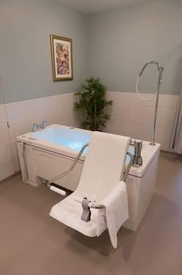 Accessible bathing area with equipment for residents