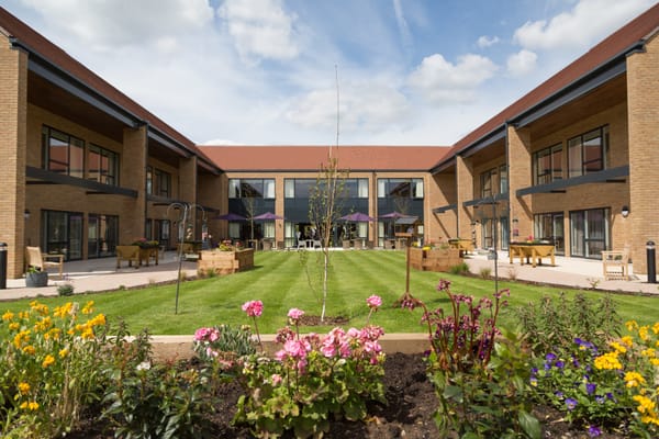 Courtyard with flowers and seating areas