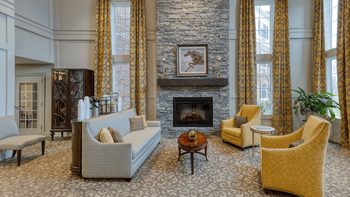 Cozy common area with comfortable seating and fireplace