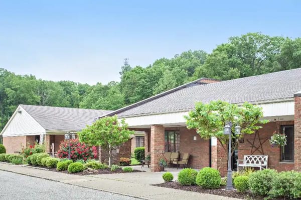Exterior view of Dunbar Center with gardens