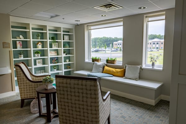 A cozy common area with comfortable seating and decor