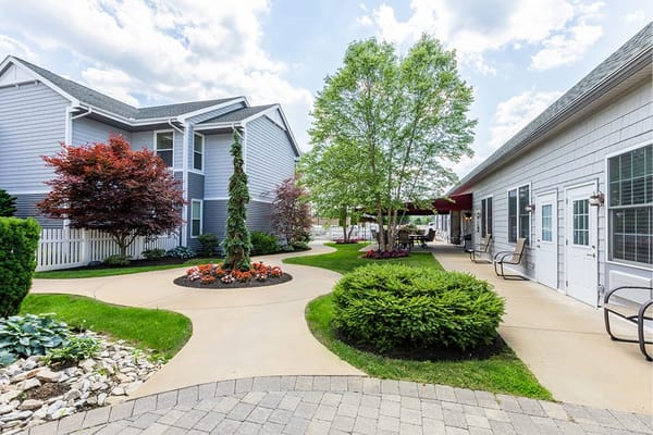 Well-maintained outdoor area with pathways and landscaping
