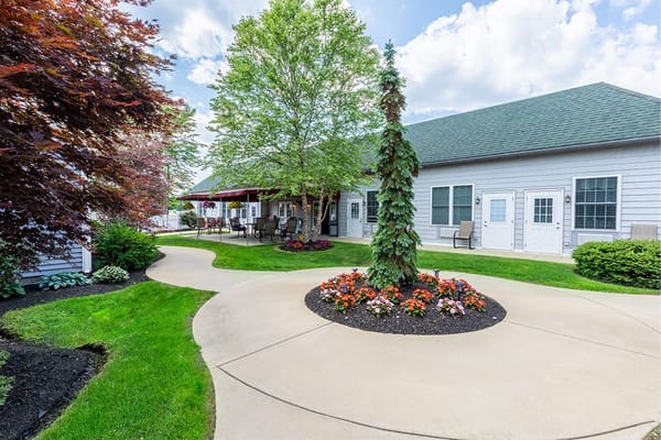 Beautiful garden area with walking paths and flowers