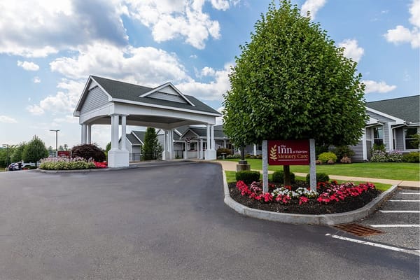Entrance of Fairview Senior Living with landscaped gardens
