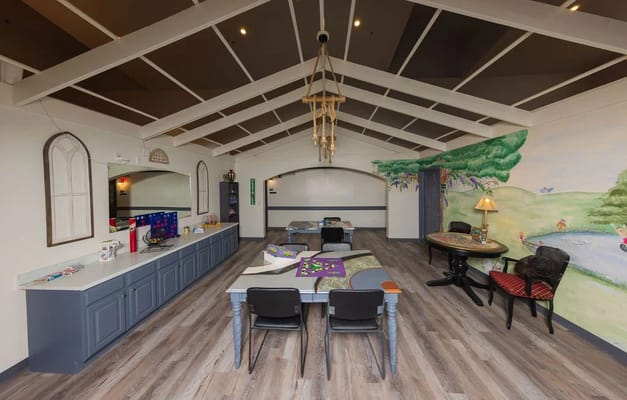 Bright interior common area with artwork and seating