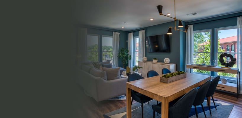 Bright and inviting common area with dining table