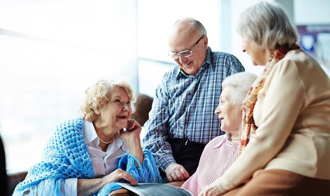 Residents enjoying time together in a communal area