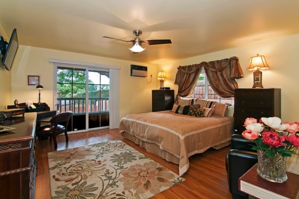 Cozy interior of a resident's room with a bed and furniture
