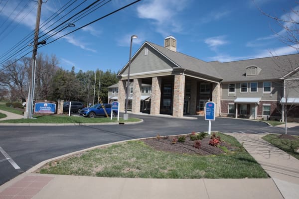 Exterior view of Forest Hills Commons building and signage