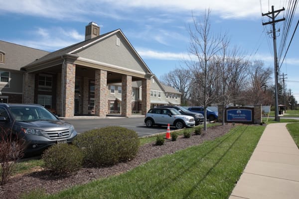 Exterior view of Forest Hills Commons building and signage