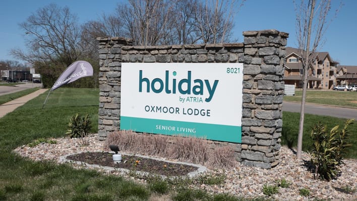 Sign for Holiday Oxmoor Lodge with facilities details