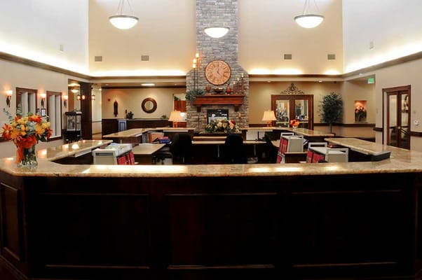 Interior view of a welcoming lobby with a fireplace