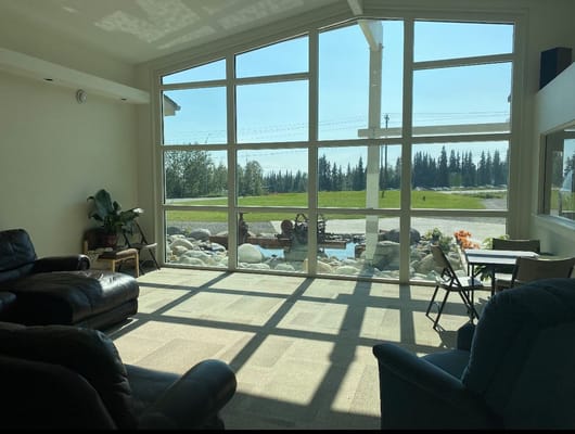 Bright interior lounge area with large windows