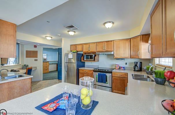 Bright kitchen space with modern appliances and snacks