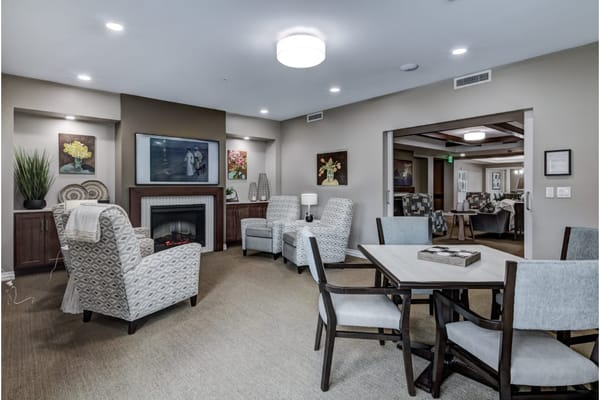 Cozy common area with seating and decorative art