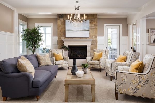 Stylish living room with a stone fireplace and comfortable seating