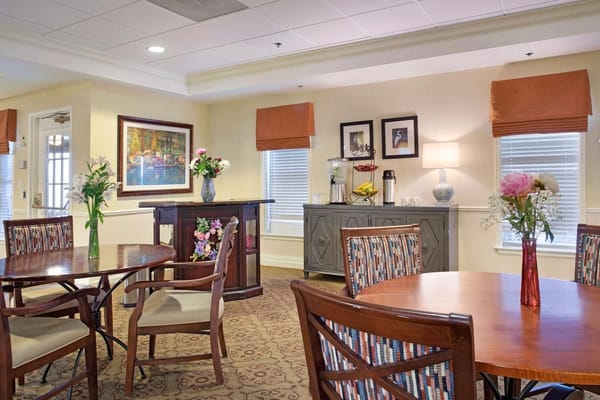 Cozy common area with tables and chairs