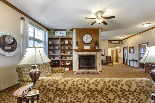 Comfortable common area with seating and a fireplace