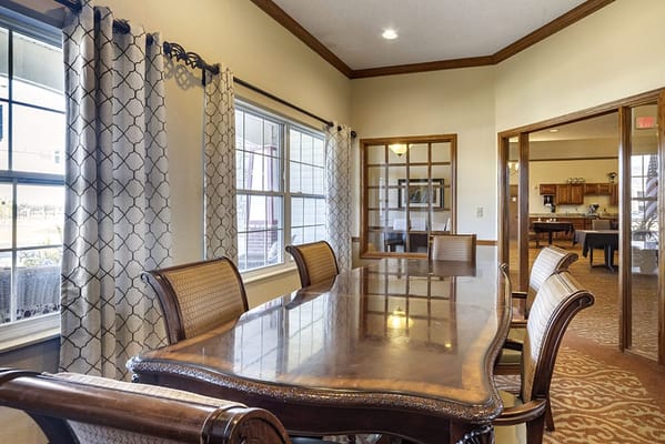Dining area with wooden table and elegant decor