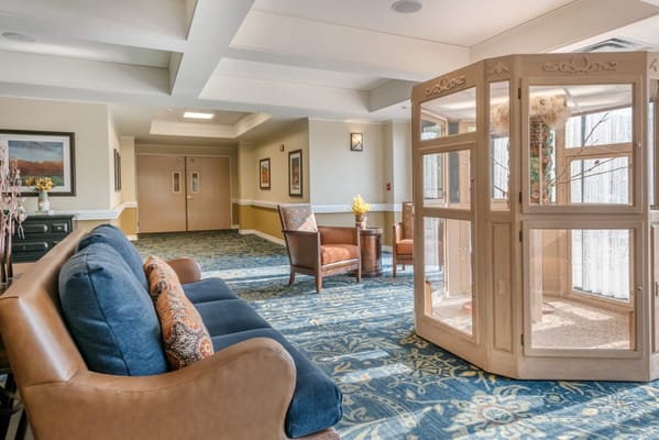 Common area with seating and decorative features