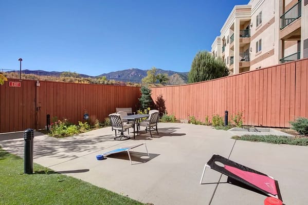 Outdoor seating area with views of mountains