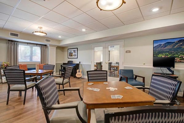 Common area with tables for activities and games