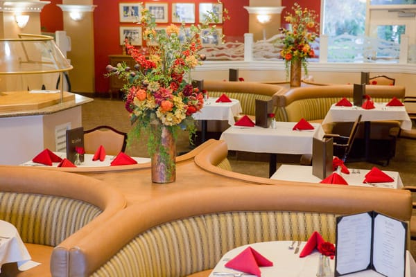 Dining area with tables set for a meal