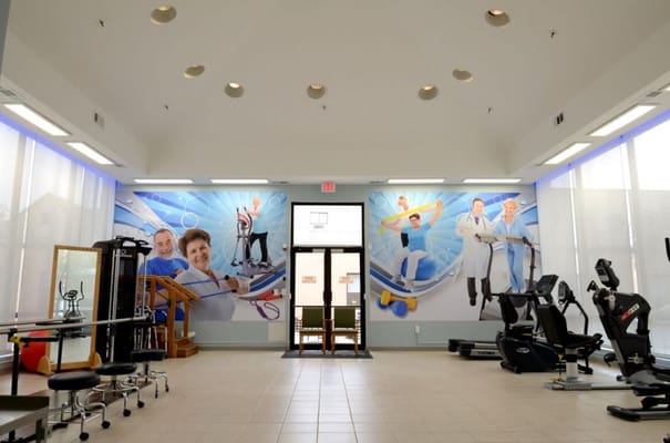 Interior view of a therapy area with exercise equipment