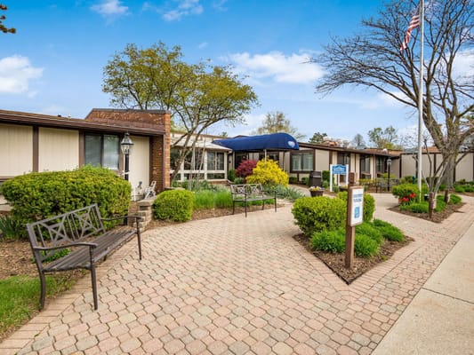 Outdoor area with pathways and gardens at retirement village