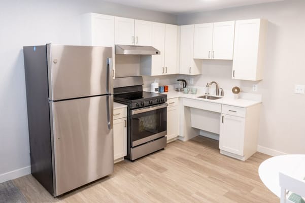 Modern kitchen area in a resident unit