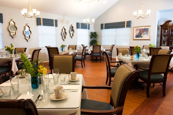 Dining room with tables set for meals