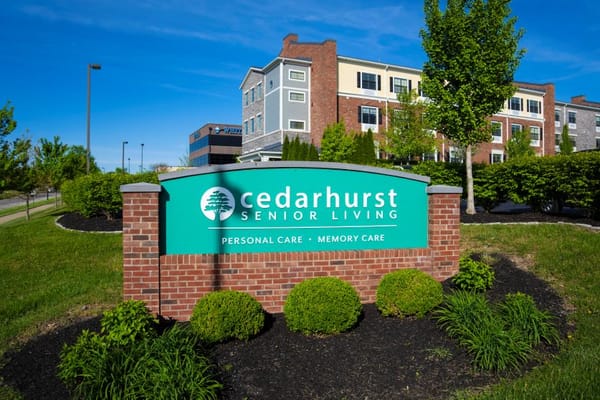Exterior view of Cedarhurst Senior Living sign and building