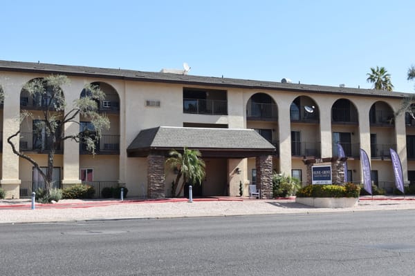 Exterior view of Olive Grove Assisted Living and Memory Care facility