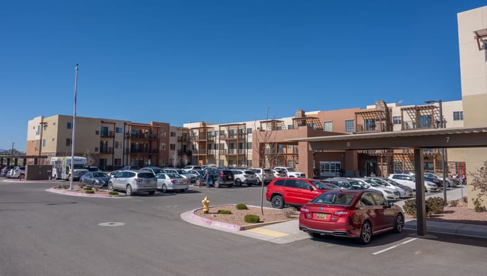 View of Las Soleras Senior Living facility with parking lot.