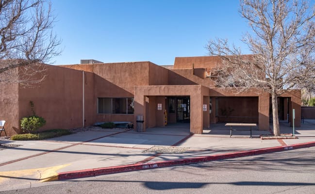 Exterior view of the assisted living facility with landscaped areas