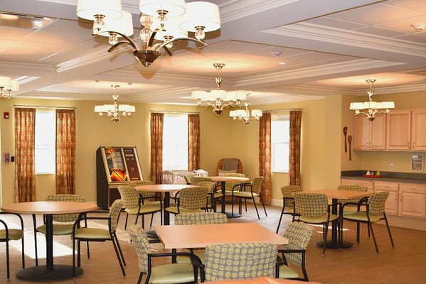 Interior view of a dining area with tables and chairs
