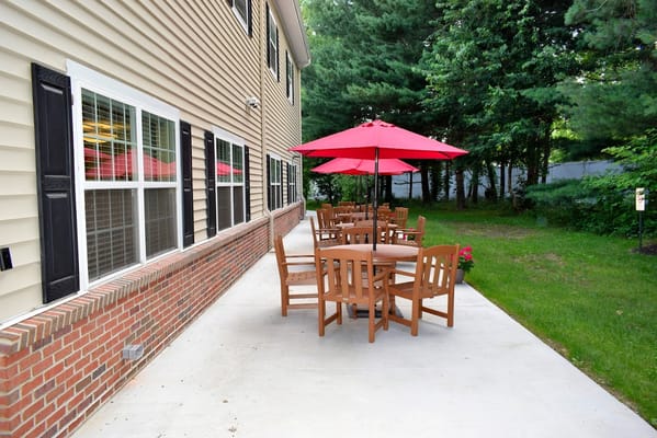 Outdoor seating area with umbrellas and tables