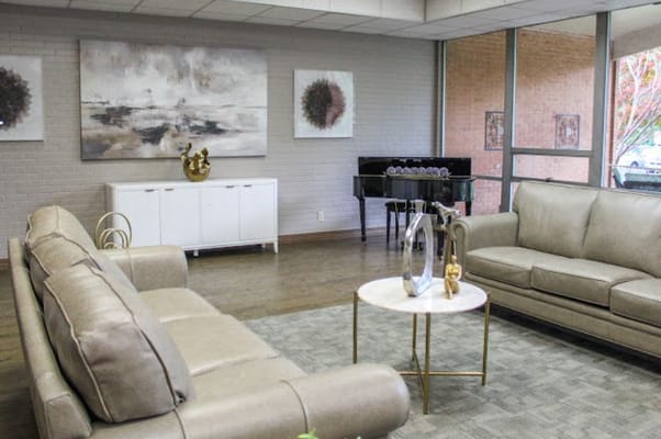 Comfortable seating area with art and decorative accents