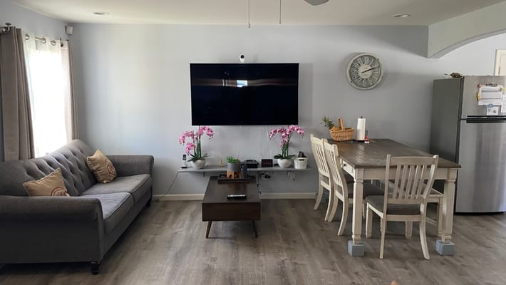 Cozy common area with seating and dining table