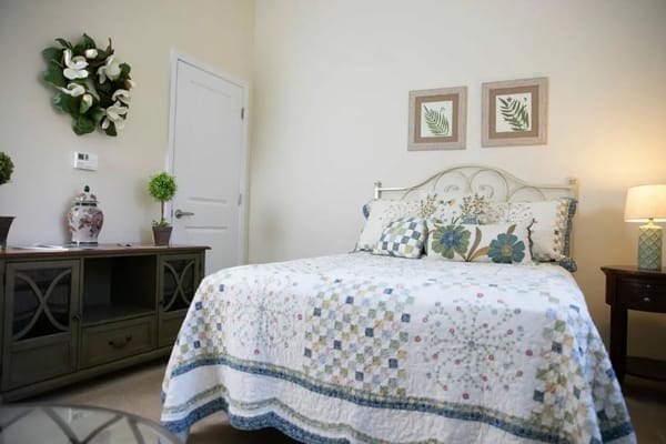 Cozy bedroom with floral decor and natural light